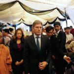 U.S. Assistant Secretary of State for Democracy, Human Rights and Labor Tom Malinowski  leaves after he paid his respect to the body of Kem Ley at a pagoda in Phnom Penh